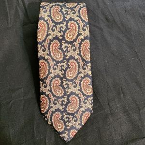 Vintage Oleg Cassini Tie,  no materials listed.  Maroon on black, 56x3 skinny